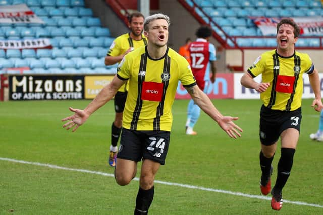 Josh March celebrates after scoring for Harrogate Town against Scunthorpe United back in February 2021. Picture: Matt Kirkham