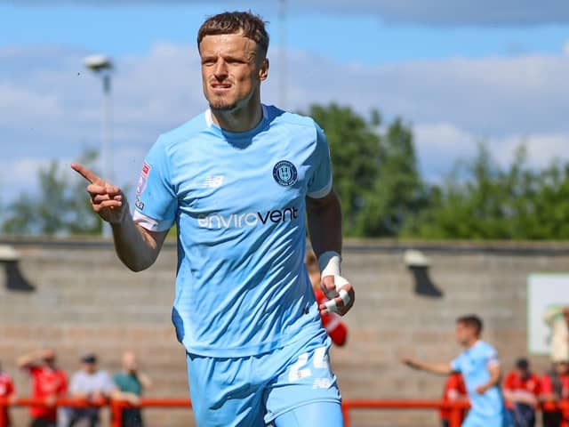 Josh March celebrates after scoring what proved to be the winning goal during Harrogate Town's 2-1 win at Morecambe. Pictures: Matt Kirkham