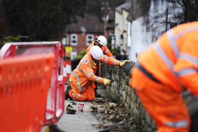 £200,000 repair project in Knaresborough - Workman tackle a section of the wall on Briggate which collapsed last year, spreading rubble across the road. (Picture Gerard Binks)