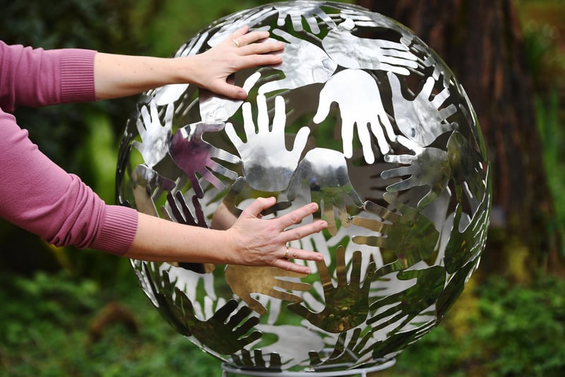 The 'Hands in Sphere' sculpture by Rinat Goldwater on display at the Himalayan Garden & Sculpture Park in Ripon