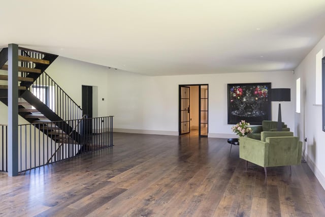 The reception area, with bespoke staircase to all floors.