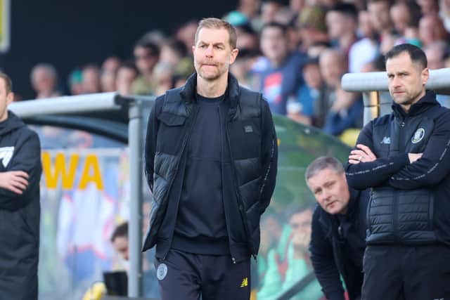 Sulphurites boss Simon Weaver watches on from his technical area.