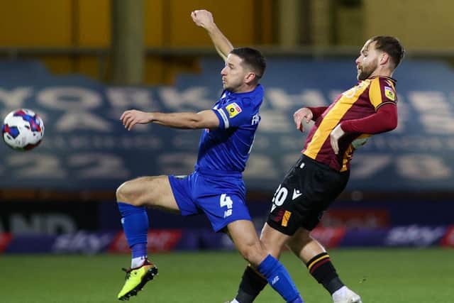 Josh Falkingham had to be replaced before half-time as Harrogate Town lost out 1-0 at Bradford City.