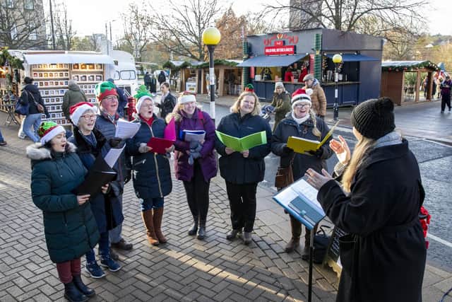 Harrogate's Enchanticas Christmas Community Choir in full song to mark the first day of the Harrogate Christmas Fayre 2023. (Picture Stephen Garnett)