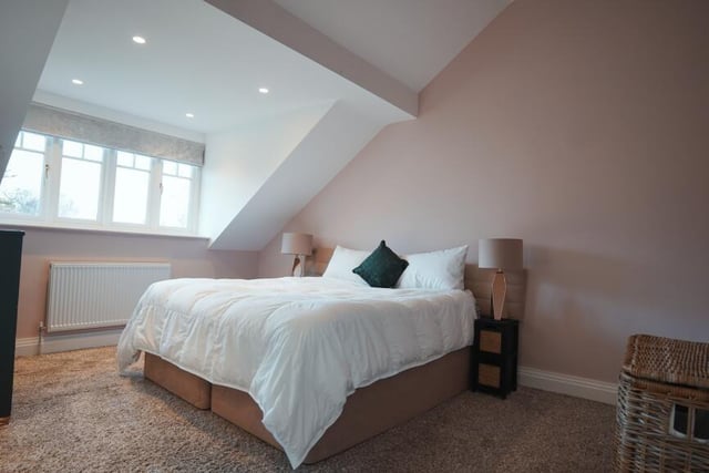 One of five bedrooms within the spacious property.