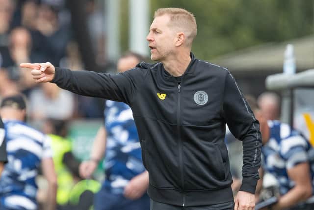 Sulphurites boss Simon Weaver points the way during Saturday's League Two clash with Grimsby.