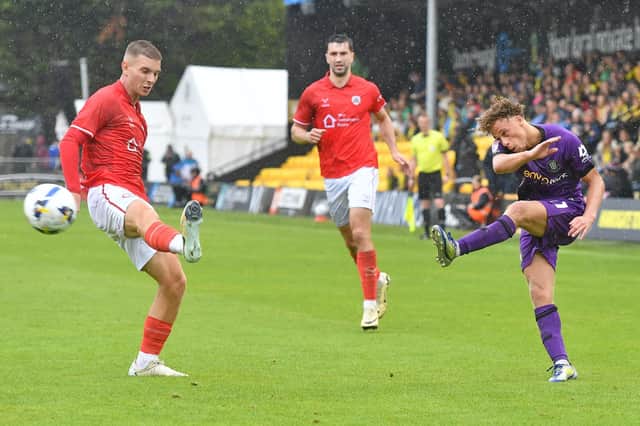 Stephen Duke-McKenna whips in a cross during Harrogate Town's pre-season defeat to Barnsley. Picture: Ian Lyall/ProSportsImages