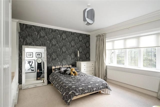 On the first floor the generous principal bedroom has its own dressing room with built-in wardrobes, as well as a large four piece en-suite bathroom. A generous guest bedroom benefits from an en-suite shower room.