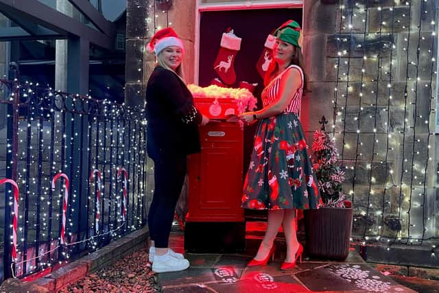 Bethany Allen (Harrogate BID) and Clemence Roux (Harrogate International Festivals) at the North Pole Post Office