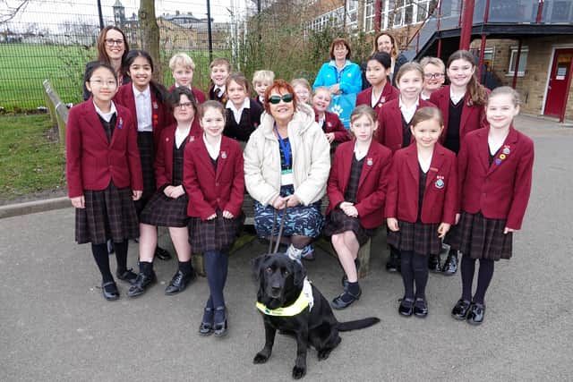 Harrogate visit - Kate Hammond and guide dog, Sheba, are pictured with members of Ashville Prep School’s Charity Club, Charity Club Co-ordinator and Class Teacher, Louise Wells, and Guide Dogs representatives Gill Darbyshire and Nicola Ridgway.