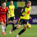 Stephen Dooley in action during Harrogate Town's 1-1 home draw with Swindon. Pictures: Matt Kirkham