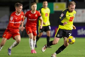 Stephen Dooley in action during Harrogate Town's 1-1 home draw with Swindon. Pictures: Matt Kirkham