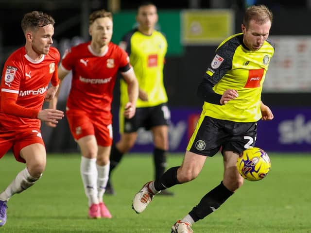 Stephen Dooley in action during Harrogate Town's 1-1 home draw with Swindon. Pictures: Matt Kirkham