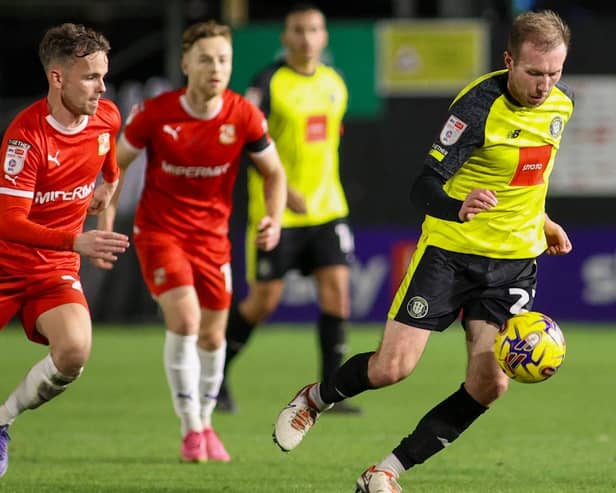 Stephen Dooley in action during Harrogate Town's 1-1 home draw with Swindon. Pictures: Matt Kirkham