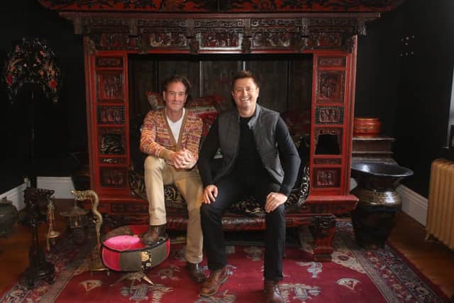 Harrogate's Mark Hinchliffe, who is selling the Grade II-listed The Chapel, pictured with TV presenter George Clarke when a TV crew from Channel 4's Restoration Man came to film. (Picture contributed)