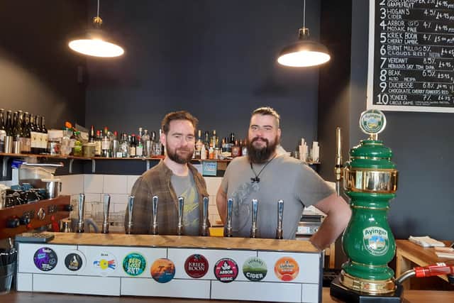 Instant hit - Matthew and Tom behind the bar at Husk Beer Emporium in its new location in Harrogate town centre. (Picture Graham Chalmers)