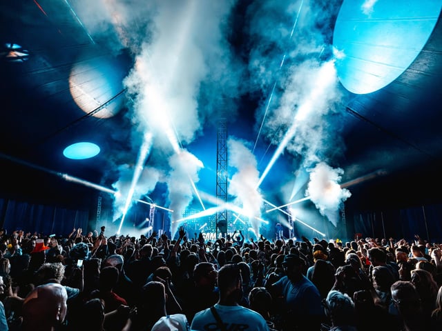 Festivalgoers enjoying the feel-good house music and vibrant atmosphere at the festival on the Stray in Harrogate