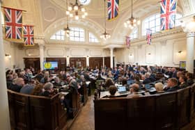 Councillors in the council chamber at County Hall.