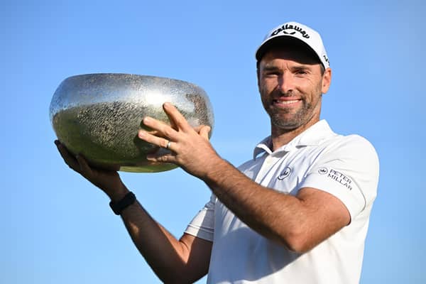 Oliver Wilson of England poses with the trophy after winning the Made in HimmerLand at Himmerland Golf & Spa Resort.