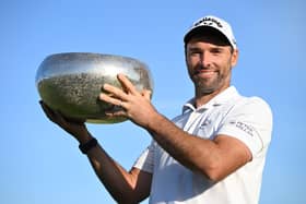 Oliver Wilson of England poses with the trophy after winning the Made in HimmerLand at Himmerland Golf & Spa Resort.