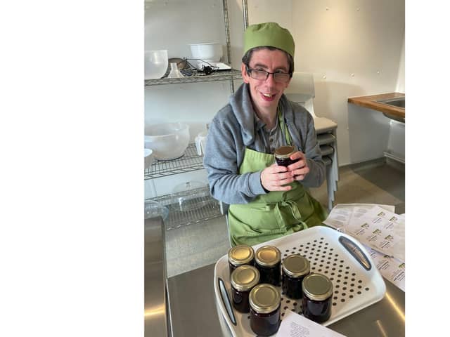 Pictured: One of the members at Ripon Walled Gardens making jams and chutney.