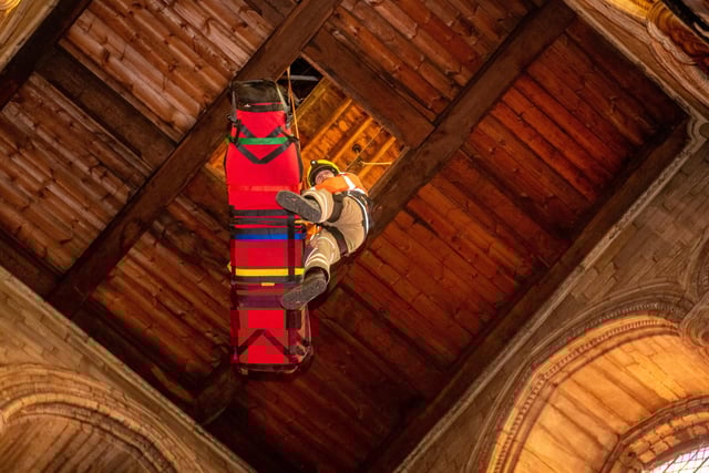 Verger Lucinda Taylor was strapped onto a stretcher and lowered 15 metres down to the cathedral floor from a trap door in the ringing room