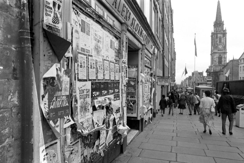 Fly-posting on the windows of High Street shop Alex Sloan in Edinburgh, August 1987.