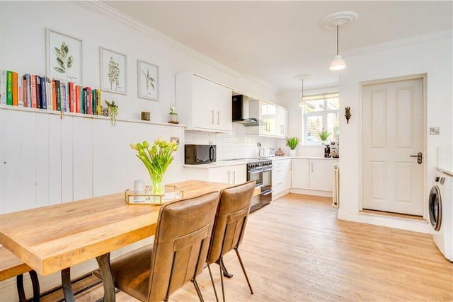 The light and spacious kitchen with diner, that has an adjacent utility room and cloakroom.