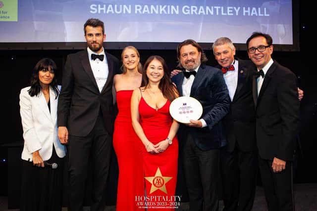 The team at Shaun Rankin at Grantley Hall, the establishment’s eponymous fine-dining restaurant,  receiving the prestigious AA Four Rosette Award 2023-2024 in London with TV by presenter Claudia Winkleman. (Picture contributed)