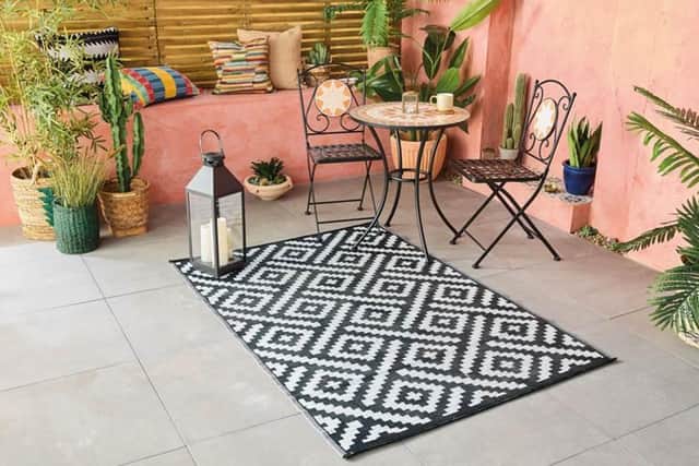 Aldi unveils new garden range including sell out rattan furniture and fire globe.