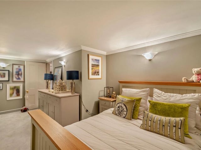 Another stunning bedroom with plenty of space.