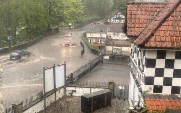 Weather nightmare - Last night's sudden storm saw the River Nidd burst its banks near the World’s End pub and Mother Shipton’s in Knaresborough with water rising onto the Low Bridge itself. (Picture contributed)