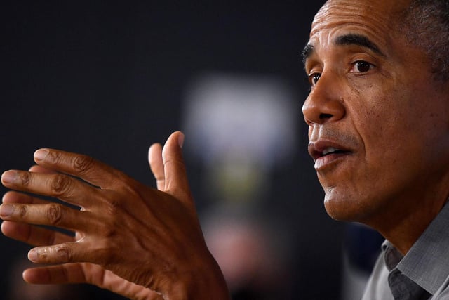 Former US President Barack Obama speaks at an event at the University of Strathclyde in Glasgow on November 8, 2021, during the COP26 UN Climate Change Conference. -