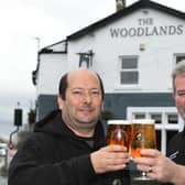 Reopened - Managers Paul Caunt and Matt Carr pictured outside The Woodlands in Harrogate after its £300,000 refurbishment. (Picture Gerard Binks)