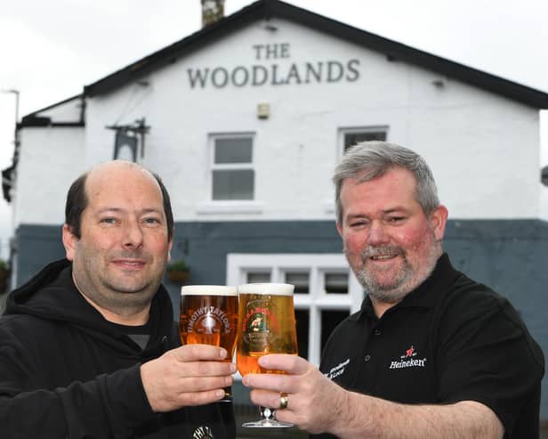 Reopened - Managers Paul Caunt and Matt Carr pictured outside The Woodlands in Harrogate after its £300,000 refurbishment. (Picture Gerard Binks)