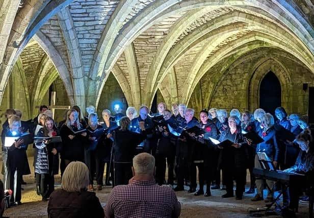 Fisher's Singers performance at Fountains Abbey in October last year