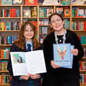 Kids Aloud art competition winner Nadia Wieclaw with Georgina Eckert, the owner of independent Harrogate book store Imagined Things. (Picture by Charlotte Gale)