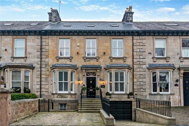 The front aspect of the period town house in a choice residential area.