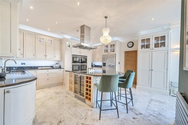 The bespoke kitchen with central island.