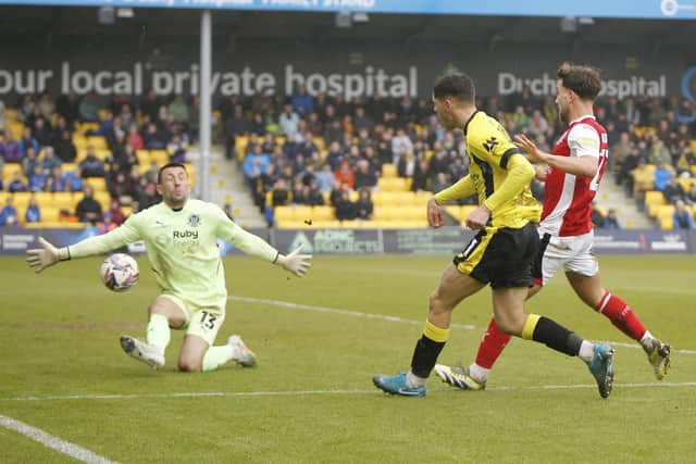 Ellis Taylor beats Fleetwood goalkeeper Jay Lynch to hand Harrogate Town a 2-1 lead at Wetherby Road.