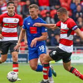 Jack Muldoon on the attack during Harrogate Town's 1-0 League Two success at Doncaster Rovers. Pictures: Matt Kirkham