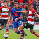 Jack Muldoon on the attack during Harrogate Town's 1-0 League Two success at Doncaster Rovers. Pictures: Matt Kirkham