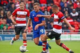 Jack Muldoon on the attack during Harrogate Town's 1-0 League Two success at Doncaster Rovers. Pictures: Matt Kirkham