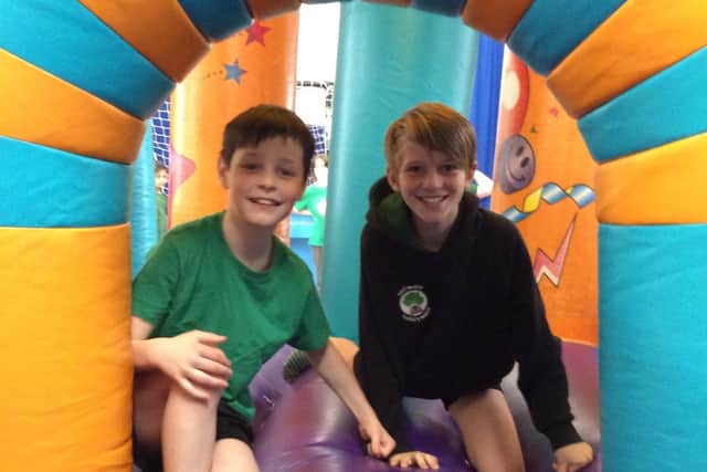 Pupils at Willow Tree Community Primary School in Harrogate enjoying the inflatable obstacle course after competing SATs exams week.