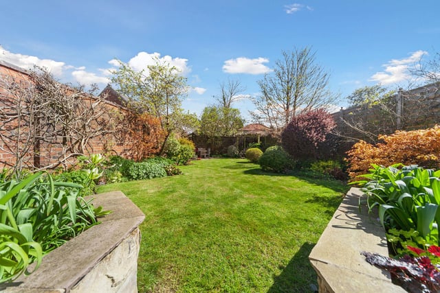 The private, established rear garden is a rarity so close to the town centre.