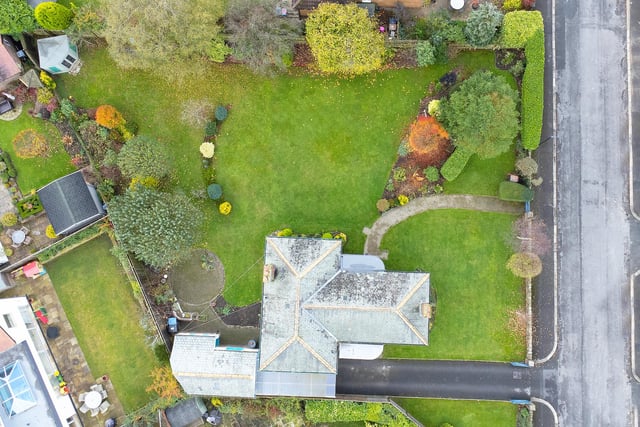 An aerial view of the house and gardens.