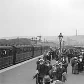 Crowds of day-trippers and holidaymakers arriving on a platform at Scarborough railway station in 1913.