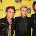 Mark Owen, Gary Barlow, and Howard Donald of Take That, who have announced a huge UK arena tour