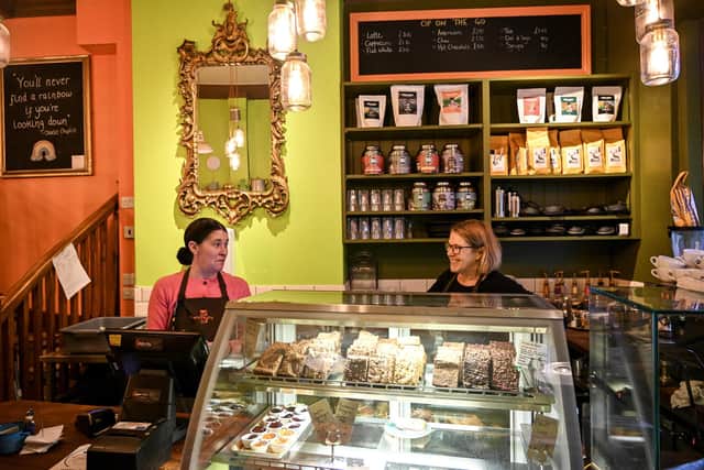 Pictured: One of the cafe's managers and owner Louise Grant at work.