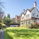 A view of the impressive Edwardian property from its lawned gardens.